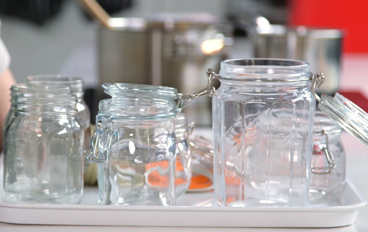 How are utensils prepared before they are used in home canning